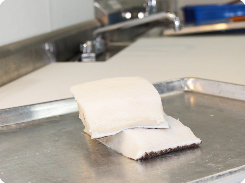 chilean sea bass fillet on cutting board