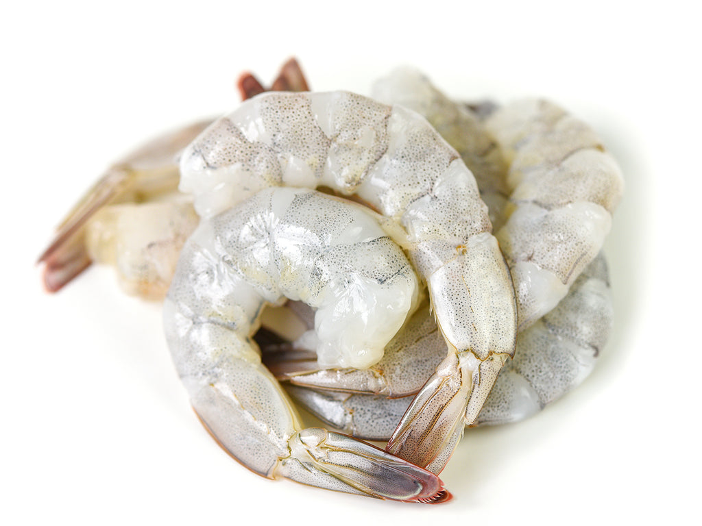 Plump, white shrimp with head and shells removed. The Black Tiger Prawns have a beautiful black speckling when removed from their shell.