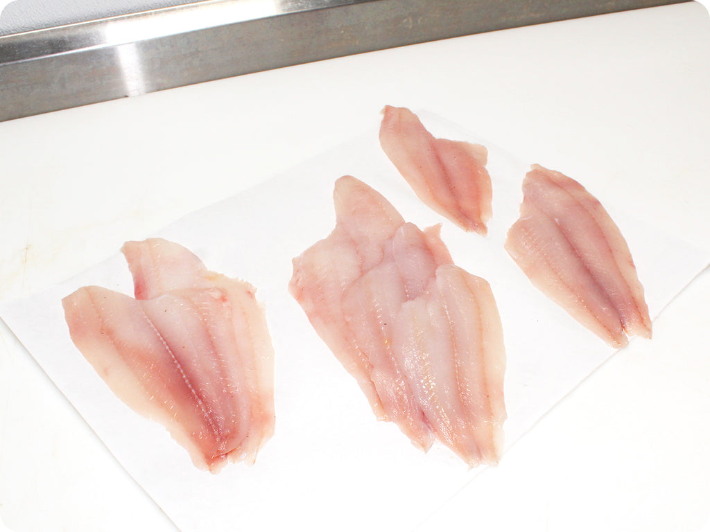 fresh petrale sole on cutting board